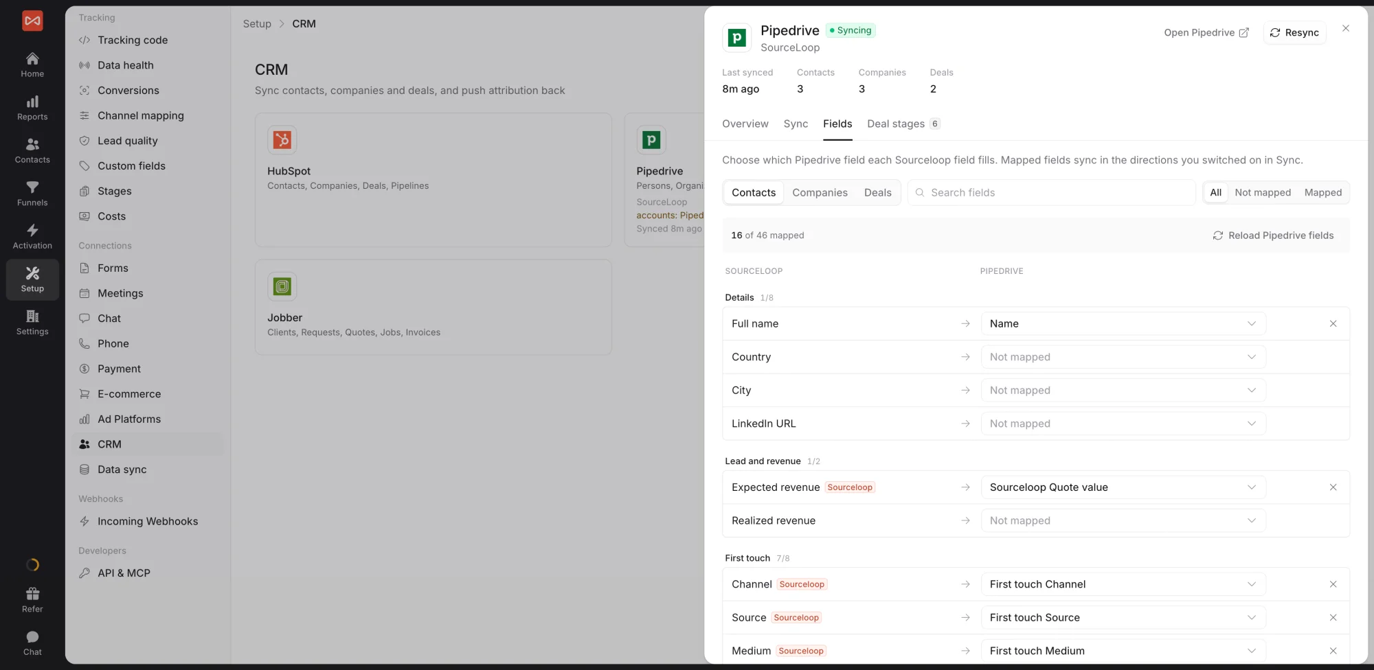 SourceLoop CRM drawer on the Fields tab, with Contacts, Companies, and Deals tabs, a search box, All, Not mapped, and Mapped filters, and SourceLoop fields mapped to CRM fields in groups for details, lead and revenue, and first touch
